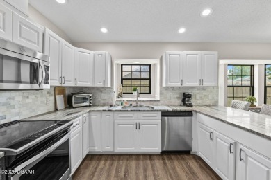 Welcome to 18 Woodhollow Lane, located in the Pine Lakes on The Grand Club - Pine Lakes Course in Florida - for sale on GolfHomes.com, golf home, golf lot