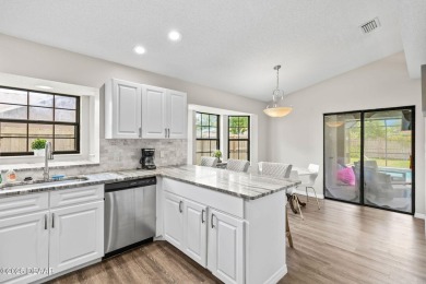 Welcome to 18 Woodhollow Lane, located in the Pine Lakes on The Grand Club - Pine Lakes Course in Florida - for sale on GolfHomes.com, golf home, golf lot