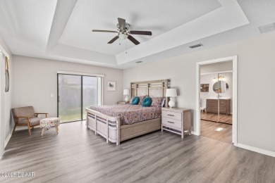 Welcome to 18 Woodhollow Lane, located in the Pine Lakes on The Grand Club - Pine Lakes Course in Florida - for sale on GolfHomes.com, golf home, golf lot