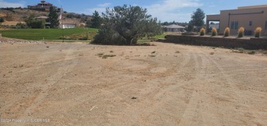 One of the few available lots left overlooking the fifteen green on San Juan Country Club in New Mexico - for sale on GolfHomes.com, golf home, golf lot