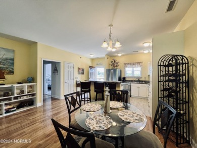 This beautiful TOP FLOOR condo with 3 bedrooms and 2 baths comes on South Harbour Golf Links in North Carolina - for sale on GolfHomes.com, golf home, golf lot