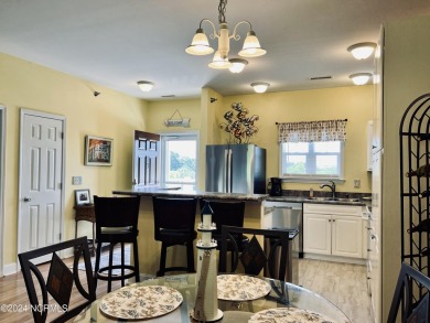 This beautiful TOP FLOOR condo with 3 bedrooms and 2 baths comes on South Harbour Golf Links in North Carolina - for sale on GolfHomes.com, golf home, golf lot