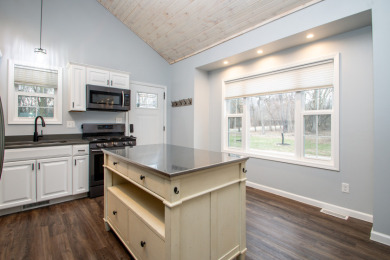 Perfect Blend of Farmhouse Charm and Serene Lake Life! on Oak Run Golf Course in Illinois - for sale on GolfHomes.com, golf home, golf lot