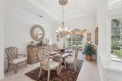 Immaculate Bonaire model with custom free form pool, amazing lot on Pelican Pointe Golf and Country Club in Florida - for sale on GolfHomes.com, golf home, golf lot