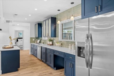 Live the resort lifestyle in this stunning, high-end renovated on The Renaisssance Vinoy Golf Club in Florida - for sale on GolfHomes.com, golf home, golf lot