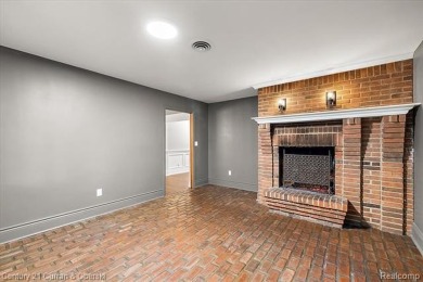 Tucked away on a wooded lot that directly backs up to McClumpha on Hilltop Golf Course in Michigan - for sale on GolfHomes.com, golf home, golf lot