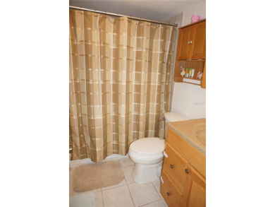 Second floor 2 Bedroom, 2 Bathroom condo with assigned covered on Saint Andrews South Golf Club in Florida - for sale on GolfHomes.com, golf home, golf lot