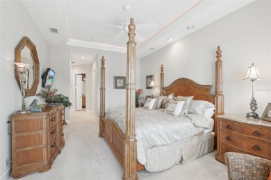 Immaculate Bonaire model with custom free form pool, amazing lot on Pelican Pointe Golf and Country Club in Florida - for sale on GolfHomes.com, golf home, golf lot