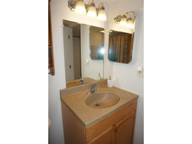 Second floor 2 Bedroom, 2 Bathroom condo with assigned covered on Saint Andrews South Golf Club in Florida - for sale on GolfHomes.com, golf home, golf lot