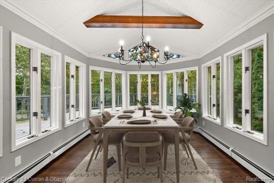 Tucked away on a wooded lot that directly backs up to McClumpha on Hilltop Golf Course in Michigan - for sale on GolfHomes.com, golf home, golf lot