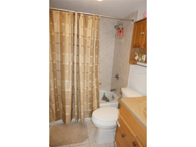 Second floor 2 Bedroom, 2 Bathroom condo with assigned covered on Saint Andrews South Golf Club in Florida - for sale on GolfHomes.com, golf home, golf lot