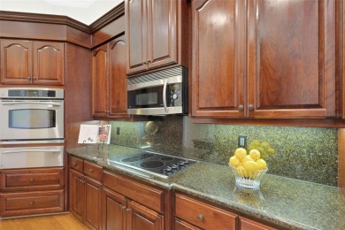 Stunning Ascot model home in Bellerive that features nearly 2 on Grasslands Golf and Country Club in Florida - for sale on GolfHomes.com, golf home, golf lot