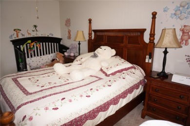 Second floor 2 Bedroom, 2 Bathroom condo with assigned covered on Saint Andrews South Golf Club in Florida - for sale on GolfHomes.com, golf home, golf lot