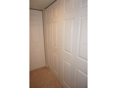 Second floor 2 Bedroom, 2 Bathroom condo with assigned covered on Saint Andrews South Golf Club in Florida - for sale on GolfHomes.com, golf home, golf lot