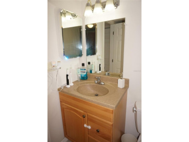 Second floor 2 Bedroom, 2 Bathroom condo with assigned covered on Saint Andrews South Golf Club in Florida - for sale on GolfHomes.com, golf home, golf lot