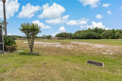 This Stratford Model is Situated perfectly on 16th hole with on Crescent Oaks Country Club in Florida - for sale on GolfHomes.com, golf home, golf lot