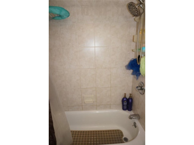 Second floor 2 Bedroom, 2 Bathroom condo with assigned covered on Saint Andrews South Golf Club in Florida - for sale on GolfHomes.com, golf home, golf lot