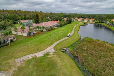 This Stratford Model is Situated perfectly on 16th hole with on Crescent Oaks Country Club in Florida - for sale on GolfHomes.com, golf home, golf lot