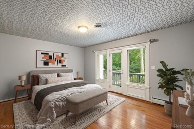 Tucked away on a wooded lot that directly backs up to McClumpha on Hilltop Golf Course in Michigan - for sale on GolfHomes.com, golf home, golf lot
