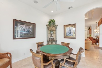 Immaculate Bonaire model with custom free form pool, amazing lot on Pelican Pointe Golf and Country Club in Florida - for sale on GolfHomes.com, golf home, golf lot