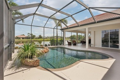 Immaculate Bonaire model with custom free form pool, amazing lot on Pelican Pointe Golf and Country Club in Florida - for sale on GolfHomes.com, golf home, golf lot