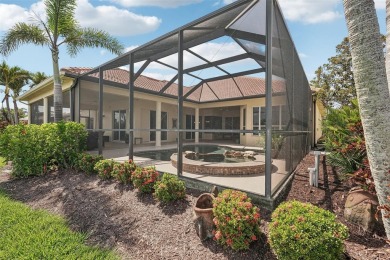 Immaculate Bonaire model with custom free form pool, amazing lot on Pelican Pointe Golf and Country Club in Florida - for sale on GolfHomes.com, golf home, golf lot