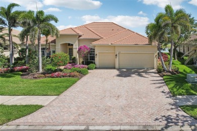 Immaculate Bonaire model with custom free form pool, amazing lot on Pelican Pointe Golf and Country Club in Florida - for sale on GolfHomes.com, golf home, golf lot
