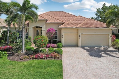 Immaculate Bonaire model with custom free form pool, amazing lot on Pelican Pointe Golf and Country Club in Florida - for sale on GolfHomes.com, golf home, golf lot