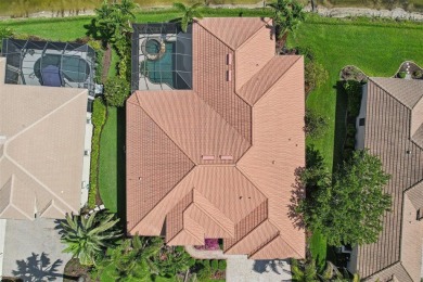 Immaculate Bonaire model with custom free form pool, amazing lot on Pelican Pointe Golf and Country Club in Florida - for sale on GolfHomes.com, golf home, golf lot