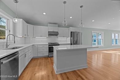 Welcome to your serene waterfront retreat at 1129 Bennett Road on Minnesott Golf and Country Club in North Carolina - for sale on GolfHomes.com, golf home, golf lot