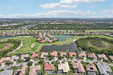 Immaculate Bonaire model with custom free form pool, amazing lot on Pelican Pointe Golf and Country Club in Florida - for sale on GolfHomes.com, golf home, golf lot