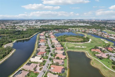 Immaculate Bonaire model with custom free form pool, amazing lot on Pelican Pointe Golf and Country Club in Florida - for sale on GolfHomes.com, golf home, golf lot