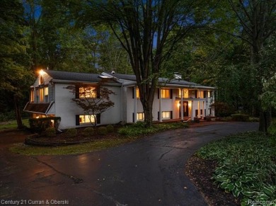 Tucked away on a wooded lot that directly backs up to McClumpha on Hilltop Golf Course in Michigan - for sale on GolfHomes.com, golf home, golf lot