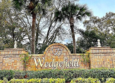 Available for sale .29 acres located in the Wedgefield community on Wedgefield Golf Club in Florida - for sale on GolfHomes.com, golf home, golf lot
