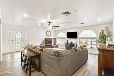 This beautifully updated 5-bedroom, 4-bathroom home in Lake on London Bridge Golf Course in Arizona - for sale on GolfHomes.com, golf home, golf lot