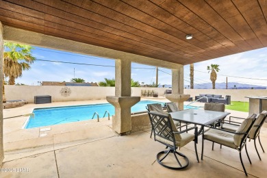 This beautifully updated 5-bedroom, 4-bathroom home in Lake on London Bridge Golf Course in Arizona - for sale on GolfHomes.com, golf home, golf lot