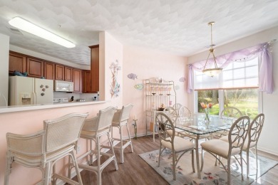 Discover the upbeat charm of this whimsical first-floor condo on Bay Creek Golf Club in Virginia - for sale on GolfHomes.com, golf home, golf lot