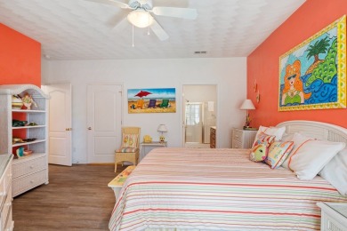 Discover the upbeat charm of this whimsical first-floor condo on Bay Creek Golf Club in Virginia - for sale on GolfHomes.com, golf home, golf lot