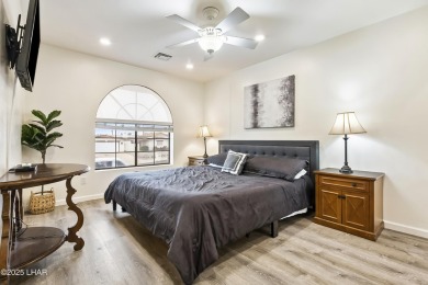 This beautifully updated 5-bedroom, 4-bathroom home in Lake on London Bridge Golf Course in Arizona - for sale on GolfHomes.com, golf home, golf lot