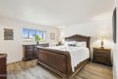 This beautifully updated 5-bedroom, 4-bathroom home in Lake on London Bridge Golf Course in Arizona - for sale on GolfHomes.com, golf home, golf lot