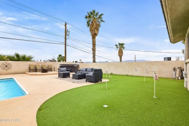 This beautifully updated 5-bedroom, 4-bathroom home in Lake on London Bridge Golf Course in Arizona - for sale on GolfHomes.com, golf home, golf lot