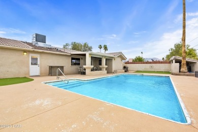 This beautifully updated 5-bedroom, 4-bathroom home in Lake on London Bridge Golf Course in Arizona - for sale on GolfHomes.com, golf home, golf lot