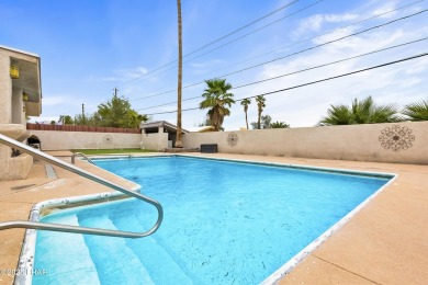 This beautifully updated 5-bedroom, 4-bathroom home in Lake on London Bridge Golf Course in Arizona - for sale on GolfHomes.com, golf home, golf lot