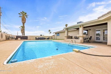 This beautifully updated 5-bedroom, 4-bathroom home in Lake on London Bridge Golf Course in Arizona - for sale on GolfHomes.com, golf home, golf lot