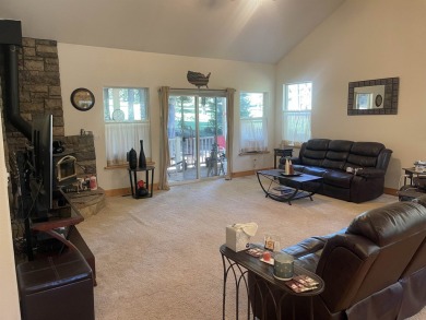 This charming 3 bedroom 2 bathroom mountain home is the perfect on Lake Almanor Country Club in California - for sale on GolfHomes.com, golf home, golf lot