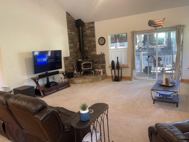 This charming 3 bedroom 2 bathroom mountain home is the perfect on Lake Almanor Country Club in California - for sale on GolfHomes.com, golf home, golf lot