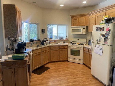 This charming 3 bedroom 2 bathroom mountain home is the perfect on Lake Almanor Country Club in California - for sale on GolfHomes.com, golf home, golf lot