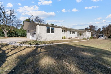 Elevated one-level living in this updated brick home on the golf on Wilson Country Club in North Carolina - for sale on GolfHomes.com, golf home, golf lot