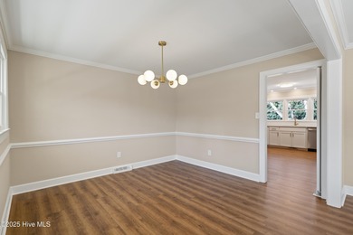 Elevated one-level living in this updated brick home on the golf on Wilson Country Club in North Carolina - for sale on GolfHomes.com, golf home, golf lot