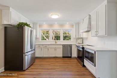 Elevated one-level living in this updated brick home on the golf on Wilson Country Club in North Carolina - for sale on GolfHomes.com, golf home, golf lot